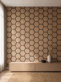 Panneau acoustique mural hexagonal finition chêne bronze dans un intérieur contemporain